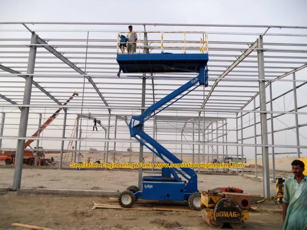Steel-framed warehouse under construction from company archive